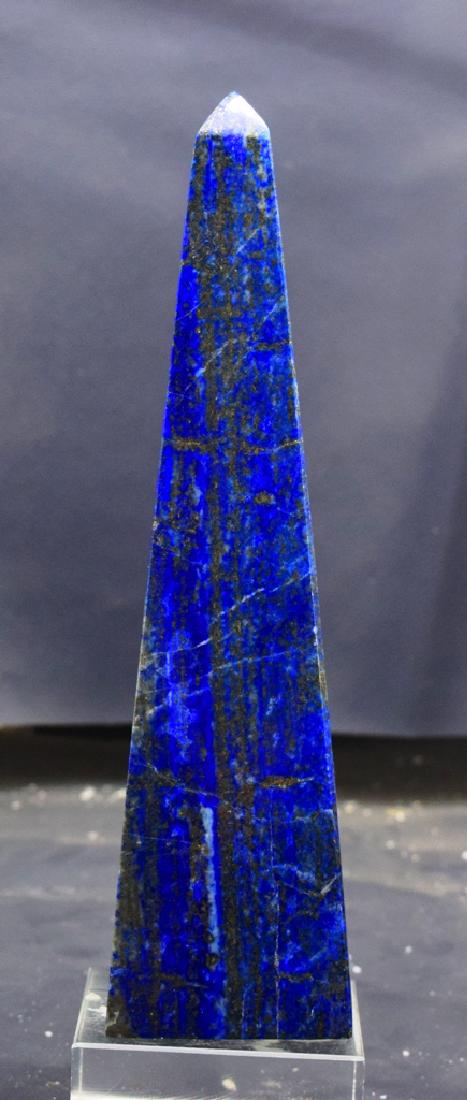 449 Gram Lapis lazuli obelisk: 449 Gram lapis lazuli obelisk weight : 449 Gram Dimensions : 160*42*42 mm origin : Afghanistan Standard DHL Shipping Please note that this lot has a confidential reserve. When you leave a bid in advan