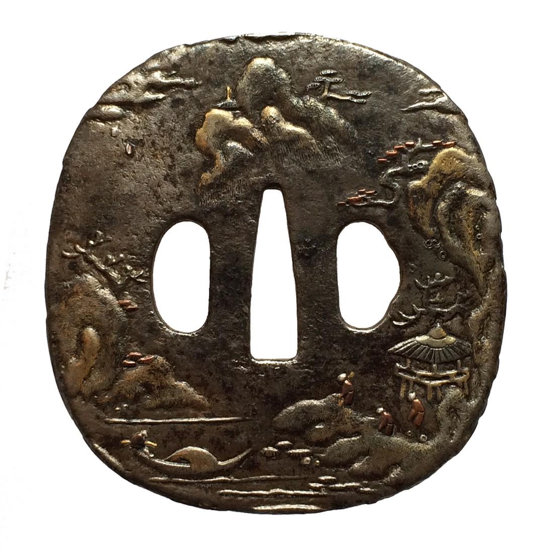 Large iron tsuba carved and inlaid with landscape motif (1 of 3)