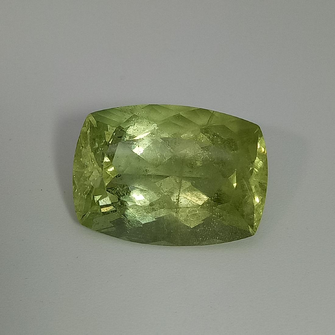 Yellow Beryl - 21.22 ct: Item: Yellow Beryl - 21.22 ct Loose gemstone Color/Clarity: VVS Carat Weight: 21.22 Size/Dimensions (mm): 21.40 x 14.80 x 10.80 Cushion - Brazil No Reserve: This lot starts at $1 and has no reserve as