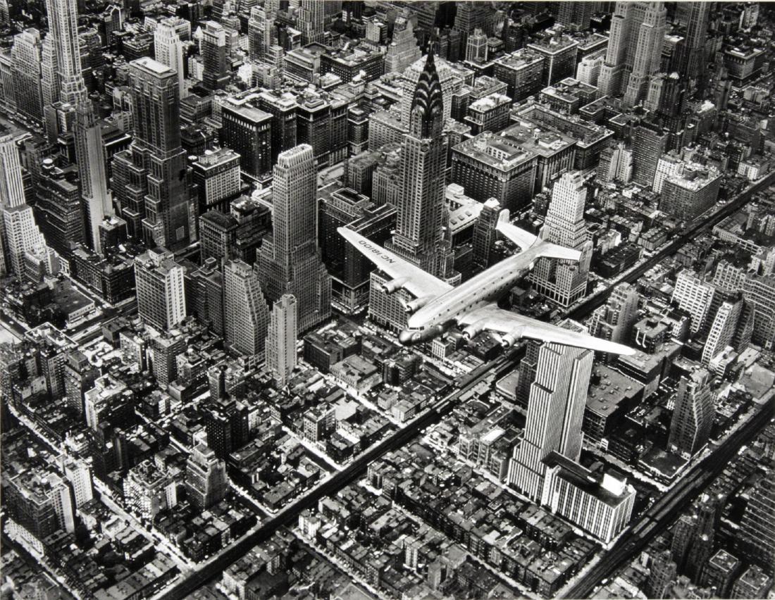 MARGARET BOURKE-WHITE - DC-4 flying over Manhattan: Artist: Margaret Bourke-White Title: DC-4 flying over Manhattan, 1939 Date Printed: 2006 Printer: Corriere della sera, Italy Printer Location: Milan Additional Info: 18.5x24.5cm - 7.2x 9 inch Mount Si