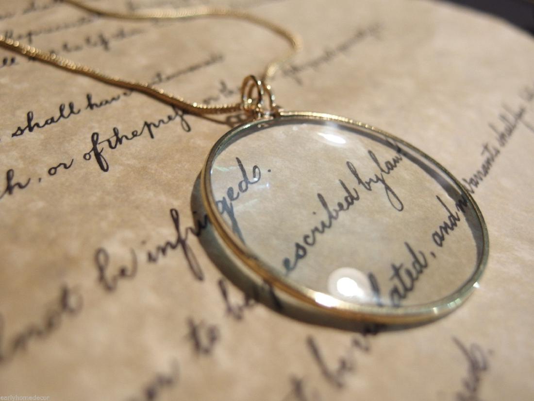 Brass Magnifying Glass Pendant Necklace: 1 3/4" Vintage Antique Style, Brass Magnifying Glass Pendant Necklace Description 20" Long x 1 3/4" Wide Wonderful reproduction magnifying glass pendant... Magnifying glasses like this were used in th
