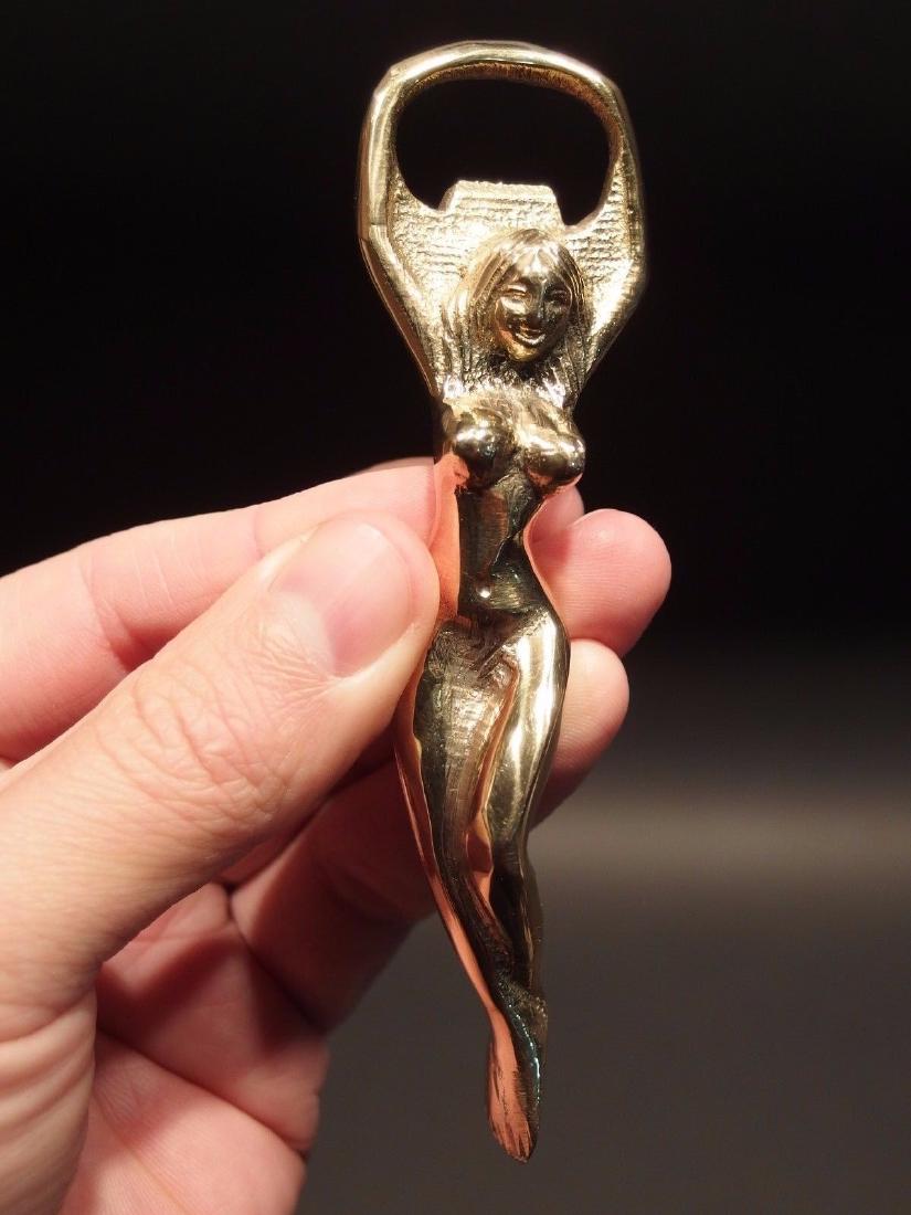 Brass Nude Lady Soda Beer Bottle Cap Opener: Antique Vintage Style Brass Nude Lady Soda Beer Bottle Cap Opener Description 4 7/8" Long ..1 1/4" Wide Great reproduction heavy solid brass bottle opener. This piece was made to look just like an ant