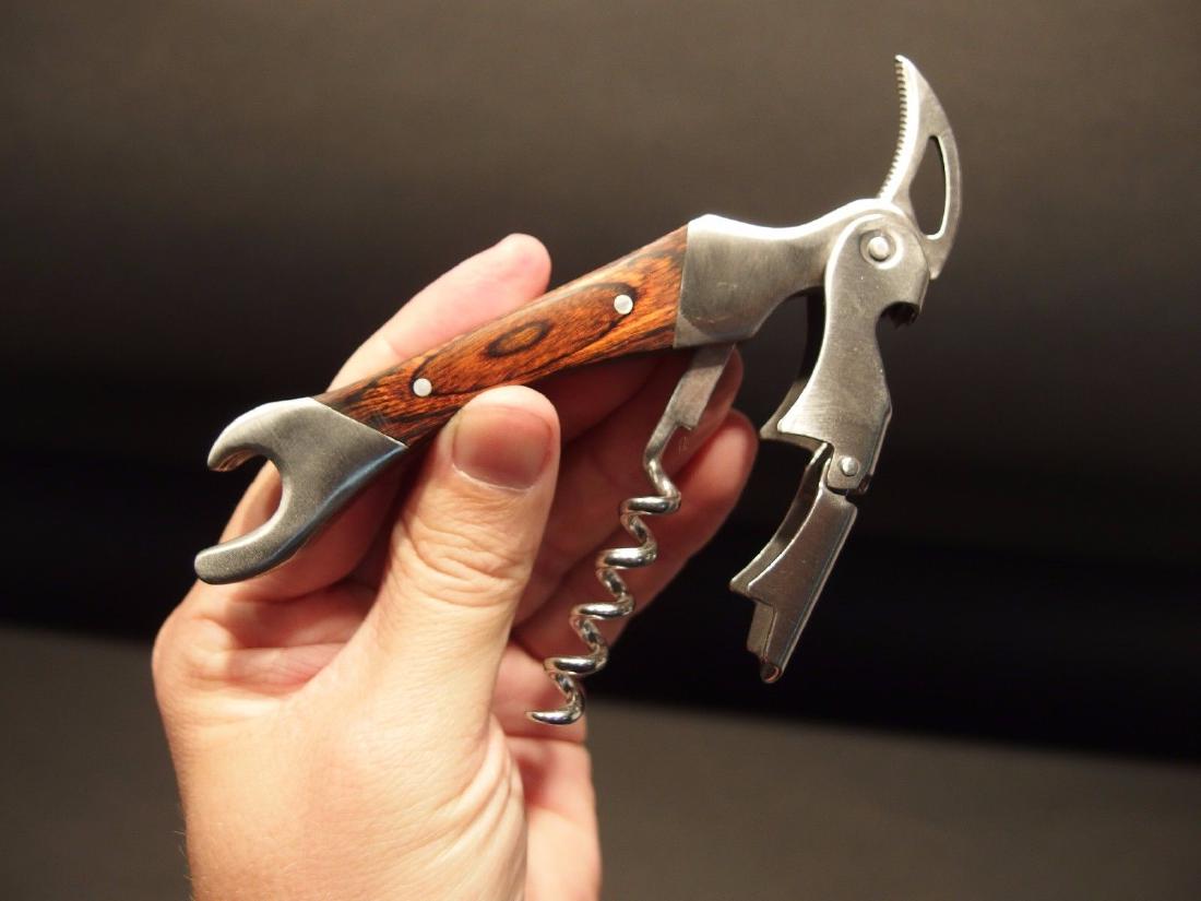 Lady Leg Beer Bottle Cap Folding Corkscrew Wine Opener: Antique Vintage Style Lady Leg Beer Bottle Cap Folding Corkscrew Wine Opener Description 5" Long .. Wonderful two lever corkscrew with a extra wide (3/8”) bottle opener end that makes this a bartend