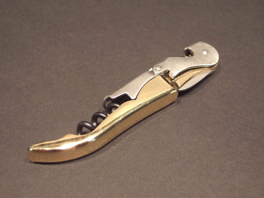 Gold Lady Leg Beer Bottle Cap Folding Corkscrew Wine: Vintage Style Gold Lady Leg Beer Bottle Cap Folding Corkscrew Wine Opener Description 5" Long .. Wonderful two lever corkscrew with a extra wide bottle opener end that makes this a bartender favorite.