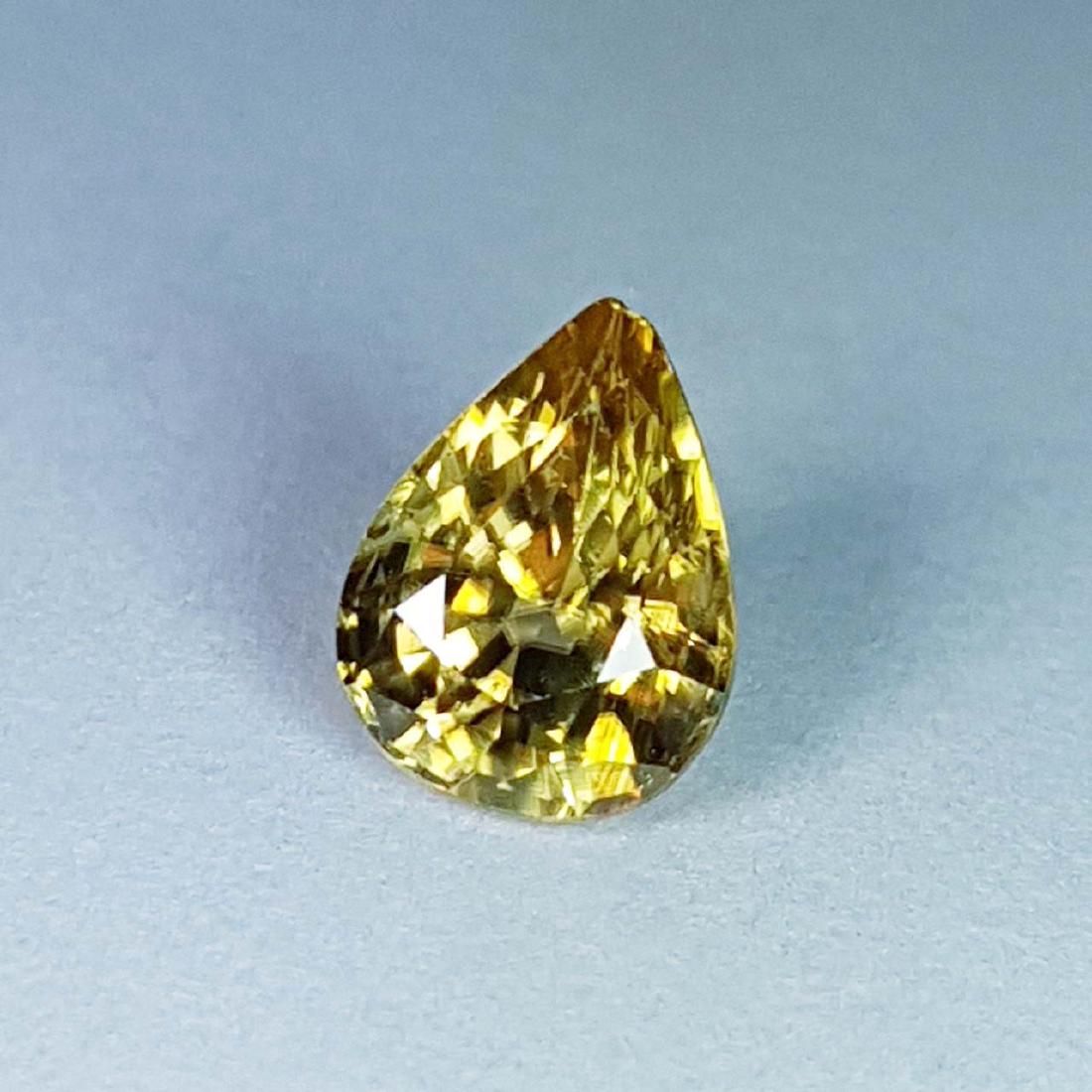 Golden Zircon - 2.01 ct: Item: Golden Zircon - 2.01 ct Loose gemstone Stone Clarity: VVS - VS Carat Weight: 2.01 Size (mm): 8.09 x 6.10 x 4.80 Pear - Cambodia No Reserve: This lot starts at $1 and has no reserve as a courtesy