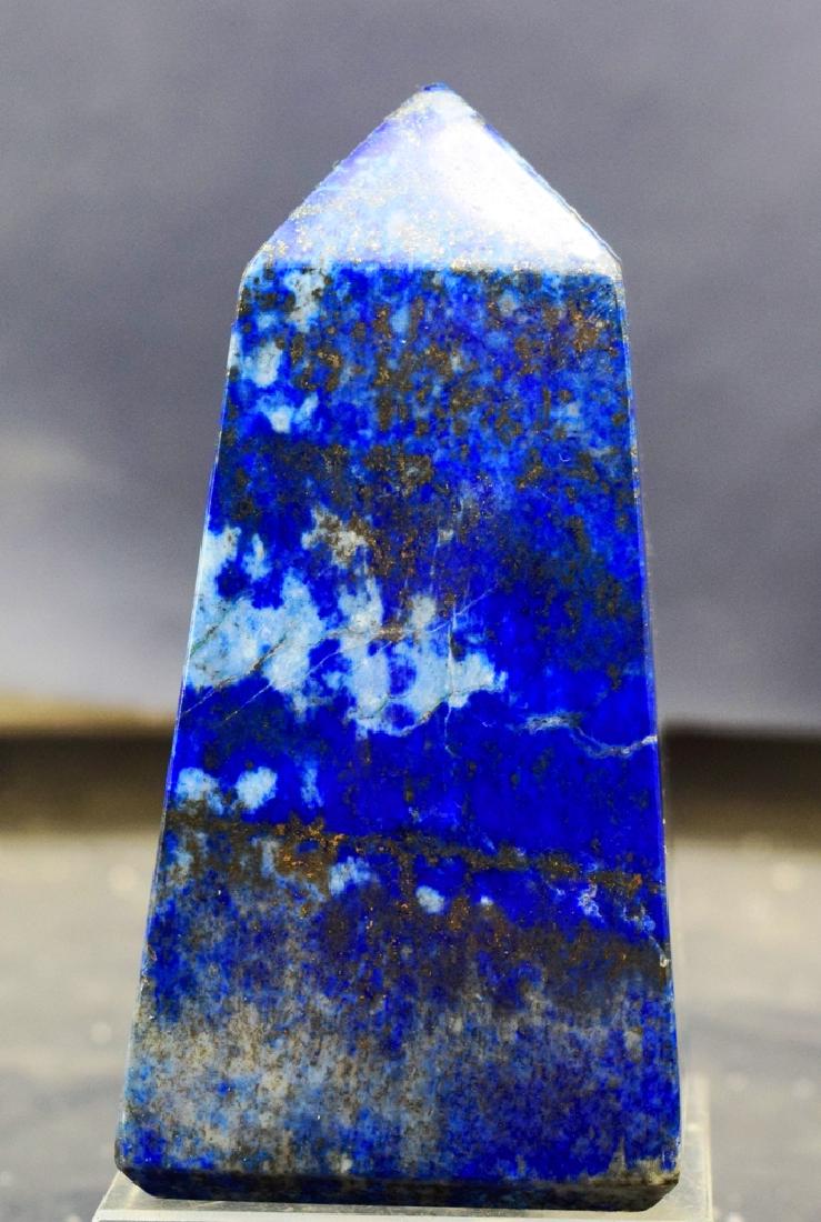 366 Gram self standing lapis lazuli obelisk: 366 Gram self standing lapis lazuli obelisk weight : 366 Gram Dimensions : 90*47*47 mm origin : Afghanistan Standard DHL Shipping Please note that this lot has a confidential reserve. When you leave a