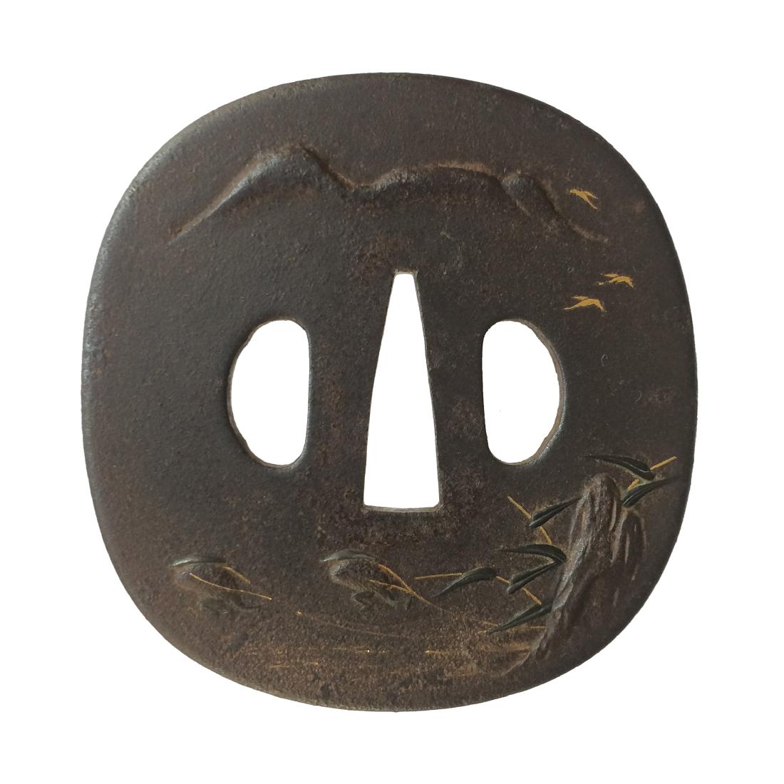 Iron tsuba with gold inlay: Item: Iron tsuba with gold inlay Origin: Japan Date: Edo period Materials: Iron, gold Dimensions: Height: 81.6 mm; Width: 78.4 mm; Thickness: 4 mm; Weight: 169 g Iron tsuba of rounded square form with