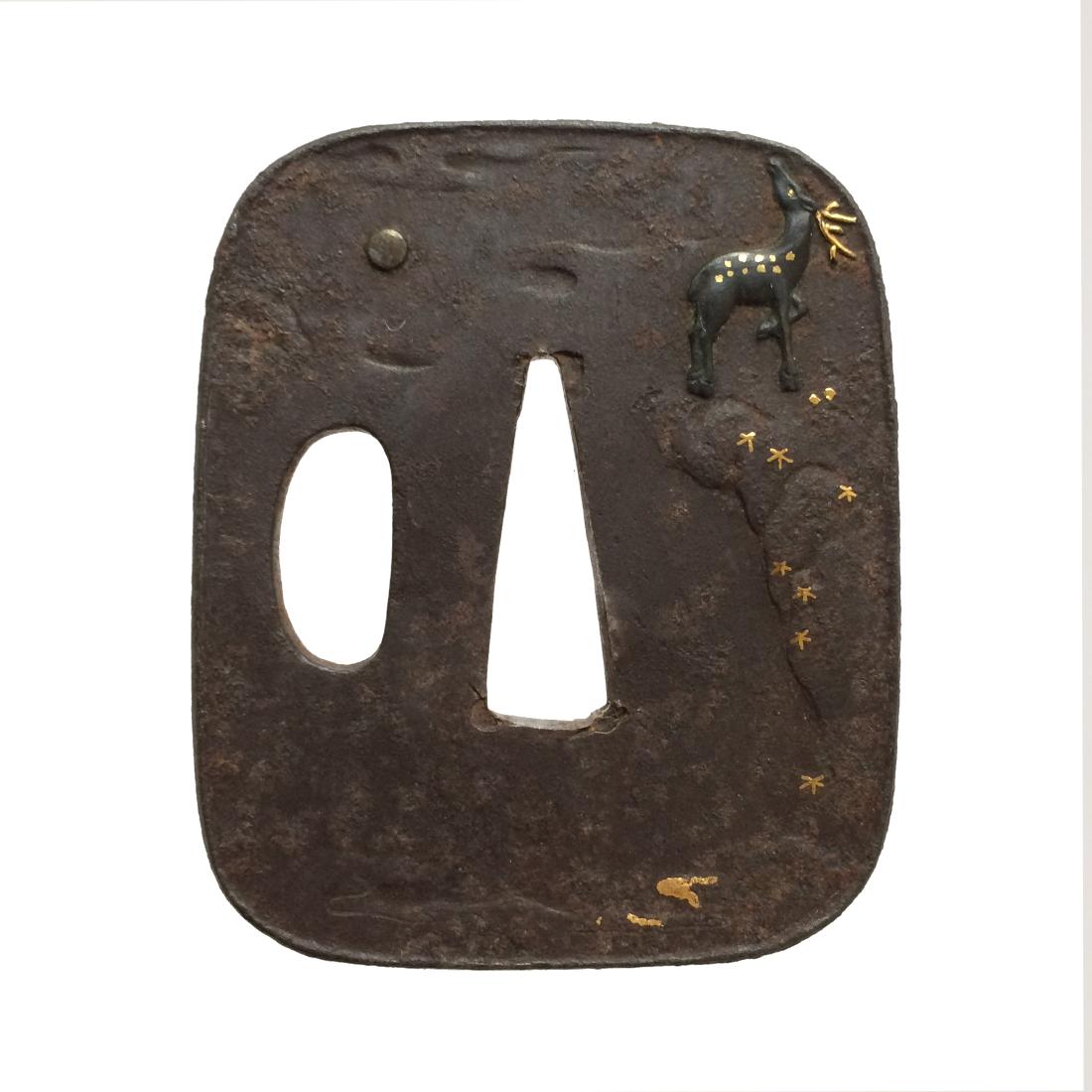Iron tsuba carved and inlaid with gold and shakudo: Item: Iron tsuba carved and inlaid with gold and shakudo Origin: Japan Date: Edo period Materials: Iron, gold, shakud? Dimensions: 60.8 x 50.7 x 3.4 mm Small yet elegant iron stuba of rounded rectangu