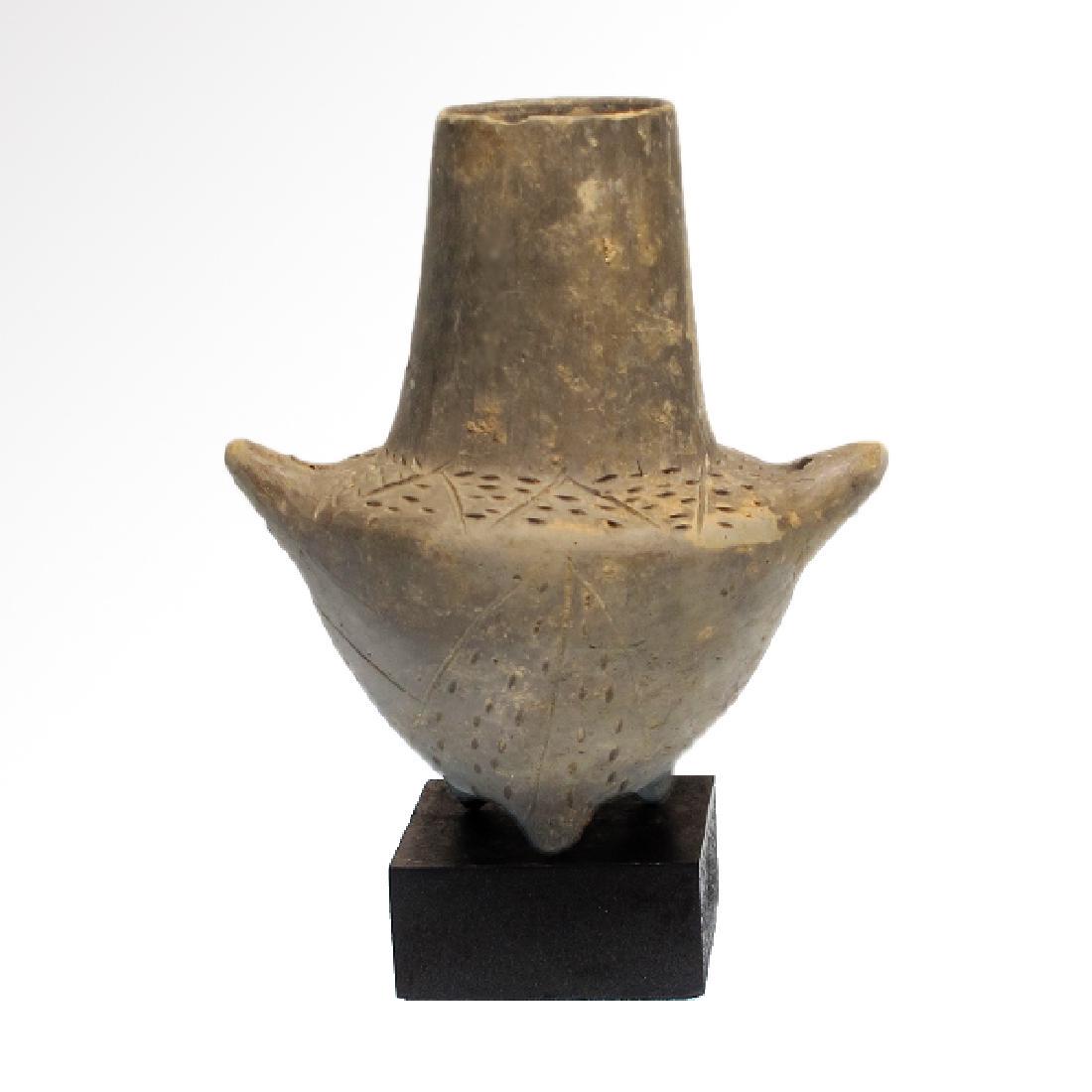 Canaanite Lotus-Poppy Terracotta Flask Levant Bronze: Canaanite Lotus-Poppy Terracotta Flask, The Levant, Bronze Age, c. 1800 B.C. Canaanite, Bronze age, c. 1800 B.C. The semi-spherical body incised with lotus-flower leaves extending to the shoulder, lon