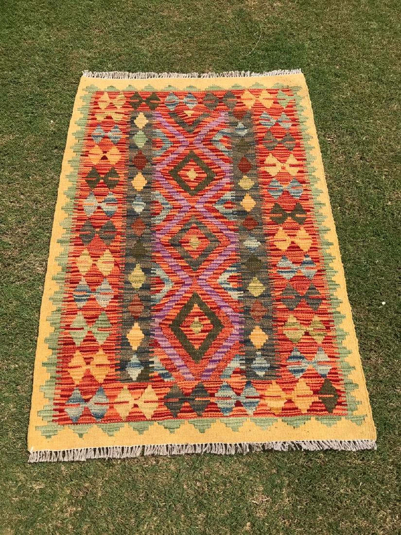 Hand Made Wool Kilim Rug 4x2.7: Hand Made Wool Kilim This is a beautiful chobi kilim and is purely hand made and new in condition. Colours are natural and can be washed easily Afghanistan 4.0 x 2.7 Feet Wool 2018 Please note that th