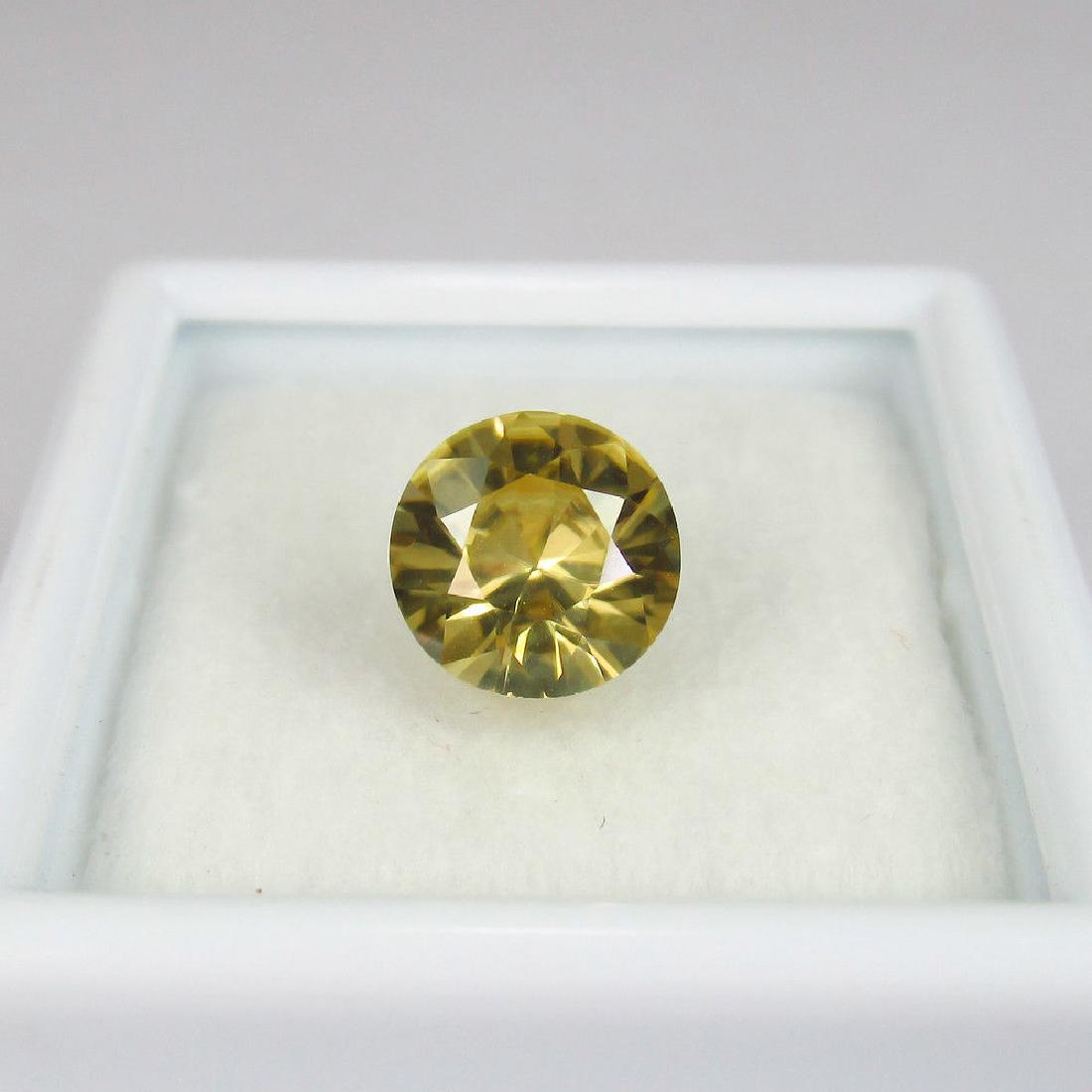 2.22 Ct Loose Yellow Zircon Round Top Luster: Item: 2.22 Ct Genuine Loose Yellow Zircon Round Top Luster Brand: Natural Yellow Zircon Stone Clarity: VVS Gemstones: Zircon Carat Weights: 2.22 Size/Dimensions: 7.60 x 7.60 x 4.50 mm Additional Infor