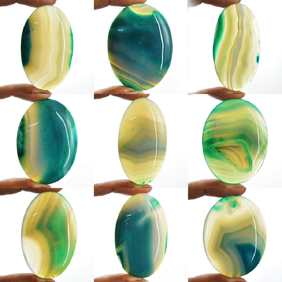 Green Onyx Gemstone Lot: "Gemstone : Onyx Weight : 810 carats Dimensions : Smallest : 44x34x07 mm Biggest : 50x38x08 mm Treatments : None Color - As seen in the image""" No Reserve: This lot starts at $1 and has no