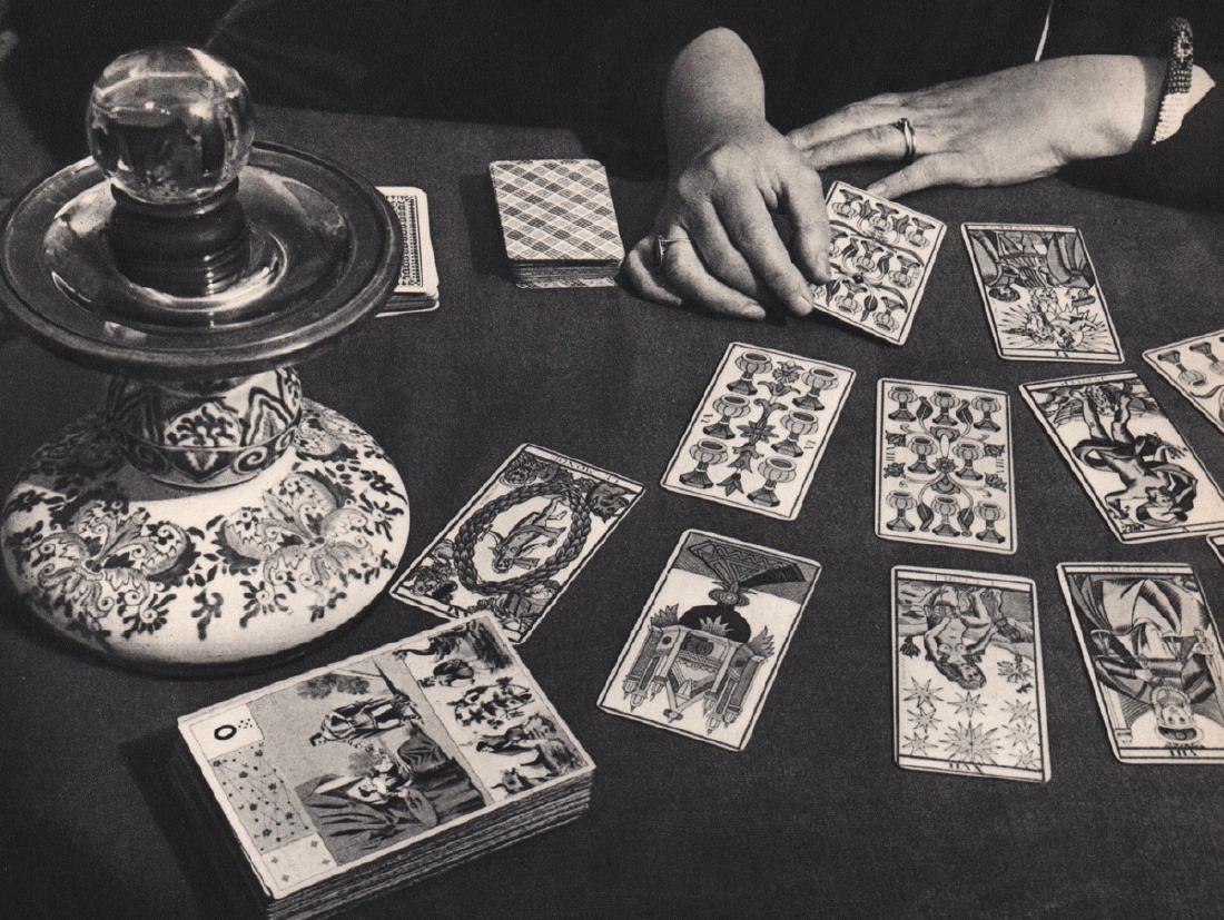 BRASSAI - Tarot Reading: Artist: BRASSAI Print Title: Tarot Reading Medium: Sheet-fed Gravure Printing Date: 1939 Printed in France Image size approx. 8.5 x 6.5 inches Brassai was a Hungarian–French photographer, sculptor,