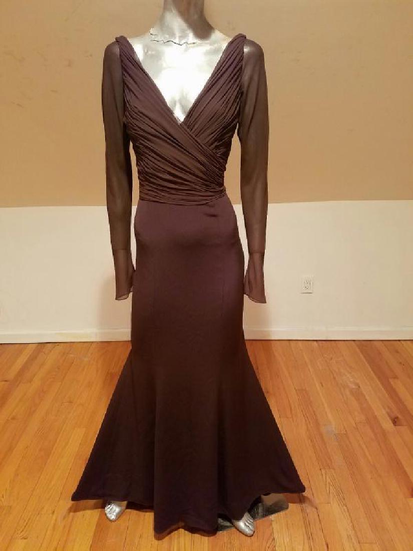 Vtg Iconic Wayne Clark retro gown with train: In a decadent chocolate in coloration, the sleeves are semi sheer. Cross over shirred bodice fitted silhouette with a back train. This one is Iconic from a truly Iconic Designer. In very good vintage 