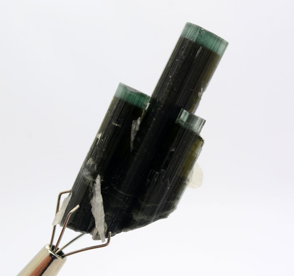 Green Cap Tourmaline Crystals~Pakistan: Item: Green Cap Tourmaline Crystals~Pakistan Treatment: Natural Material: Tourmaline Weight: 8 Gram Dimensions: 37x18x15 mm Origin: Pakistan No Reserve: This lot starts at $1 and has no reserve as a c