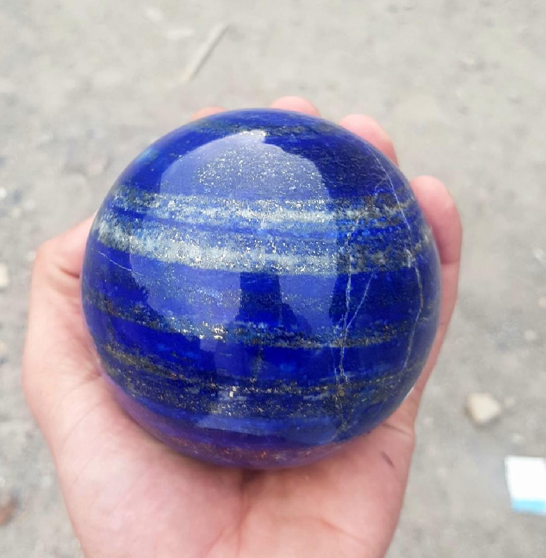 Lapis Lazuli Sphere~Afghanistan: Item: Lapis Lazuli Sphere~Afghanistan Treatment: Natural Material: Lapis Lazuli Weight: 1450 Gram Dimensions: 97 mm Origin: Afghanistan Please note that this lot has a confidential reserve. When you l