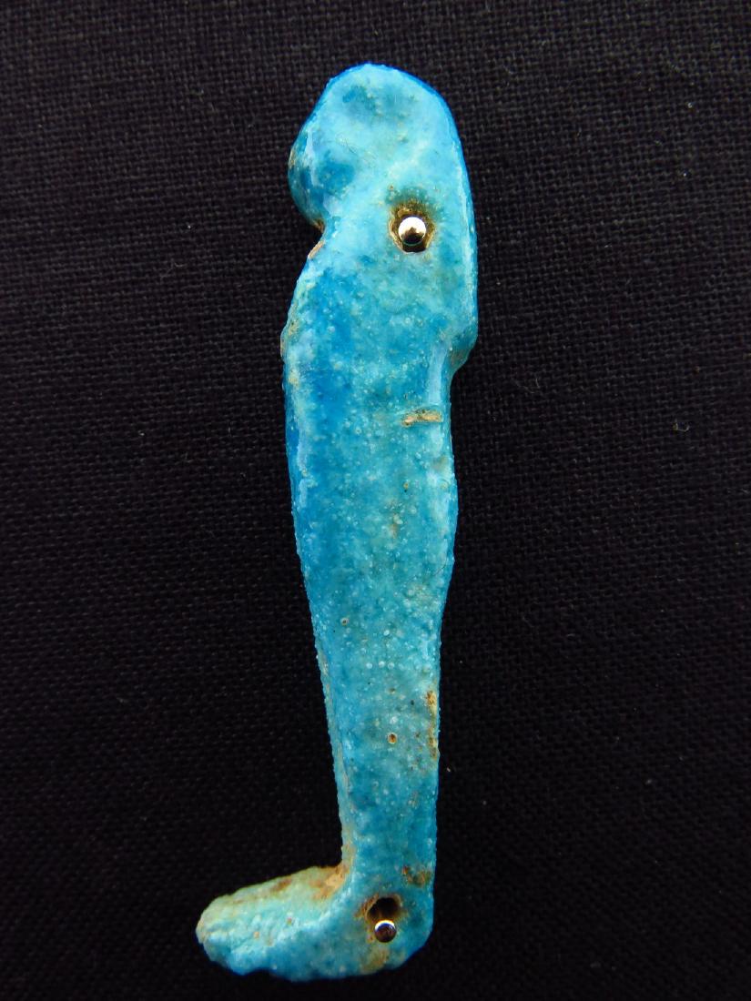 Egyptian Faience Mummy Amulet of Hapy: Egyptian faience mummy amulet of Hapy Date: 664 - 332 BC. Hapy is onethe sons of Horus and was dedicated to protectthe lungs duringthe transfer tothe afterlife. these kinds of amulets were stitched on