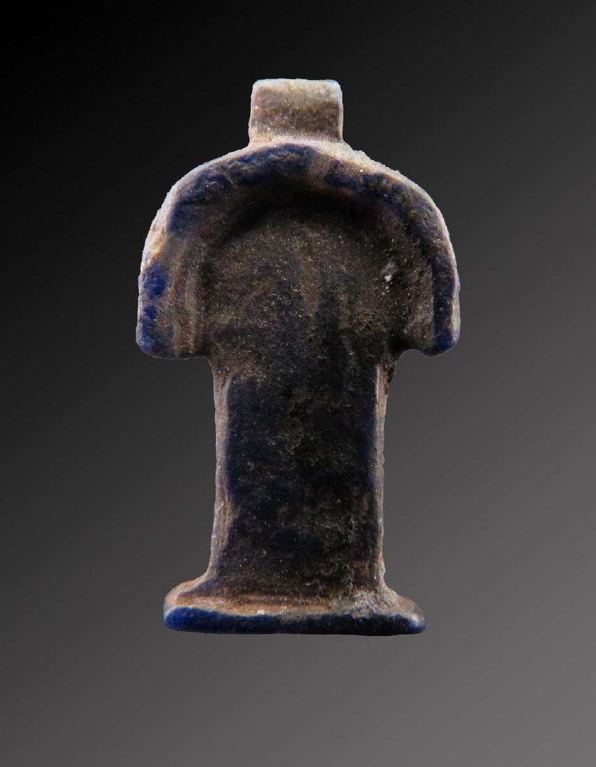 Egyptian Lapis Lazuli Girdle of Isis Amulet: Egyptian Lapis Lazuli Girdle of Isis amulet Date: 1570 - 1070 BC. Tyet is a symbol fromthe ancient Egyptiansthat, fromthe New Kingdom, belongs tothe Goddes Isis. It is also called the girdle of Isis. 