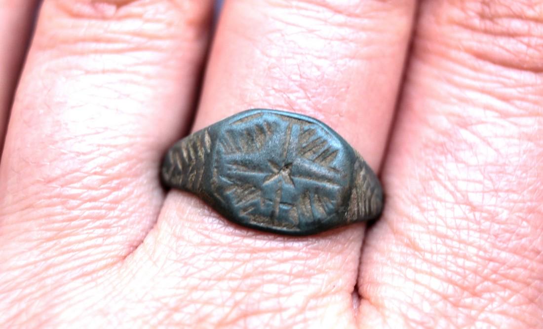 Post Medieval Bethlehem Star Bronze Ring: Post Medieval Bethlehem star bronze ring Origin: Europe Period: 15th - 17th century AD Material: bronze Size: D19mm place of discovery - Ukraine, Ukrainian private collection Please note that this lot