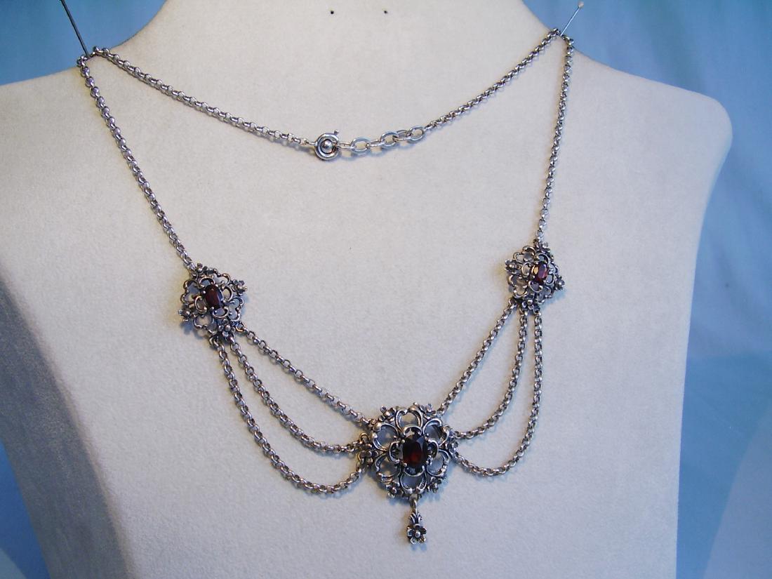 Silver necklace with garnets (1 of 7)