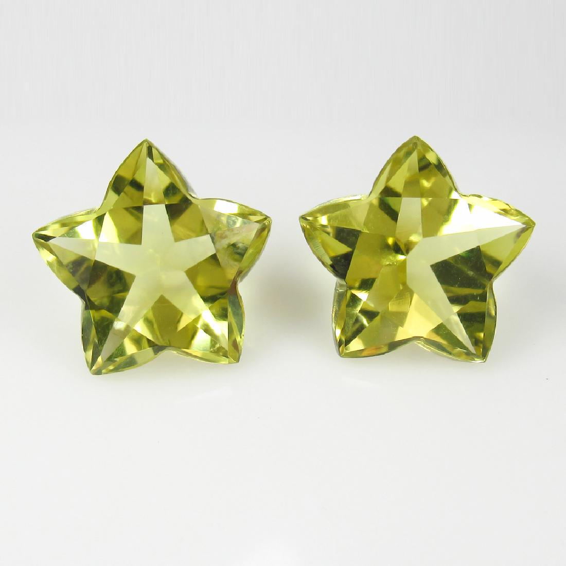 14.33 Ctw Natural Loose Fancy Star Cut Lemon Quartz: Item: 14.33 Ctw Natural Loose Fancy Star Cut Lemon Quartz Matching Pair Loose Gemstone: Natural Lemon Quartz Pair Color/Clarity: IF Carat Weight: 14.33 Dimensions: 13.80 x 13.80 x 8.30 mm Top Quality 