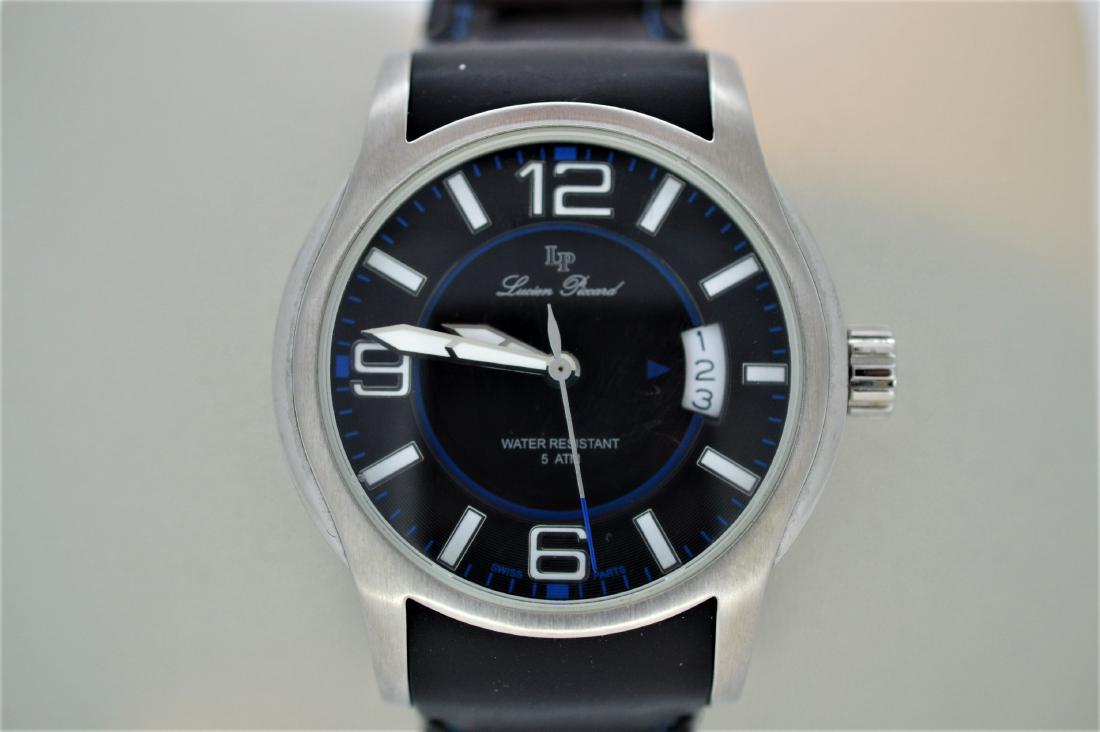 Lucien Piccard Wristwatch: Item: Lucien Piccard Wristwatch Brand: Lucien Piccard Model: Model #28163BU Case Metal: stainless steel back Case Size: 41mm Bracelet Type: Silicone band Bracelet Length: 10" long from end to end Wate