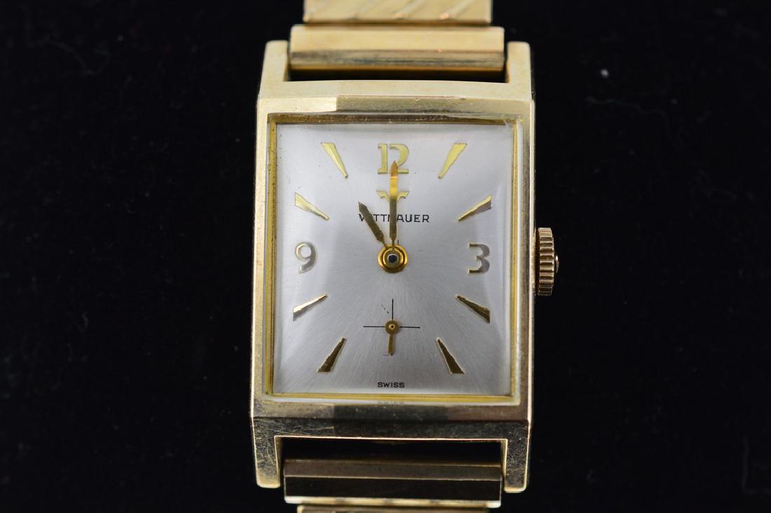 Wittnauer 10k Gold Filled Wristwatch: Item: Wittnauer 10k Gold Filled Wristwatch Brand: Wittnauer Case Metal: 10k gold filled Case Size: 22mm Bracelet Length: 7 1/2" flexible Swiss wristwatch with flexible wristband Please note that this