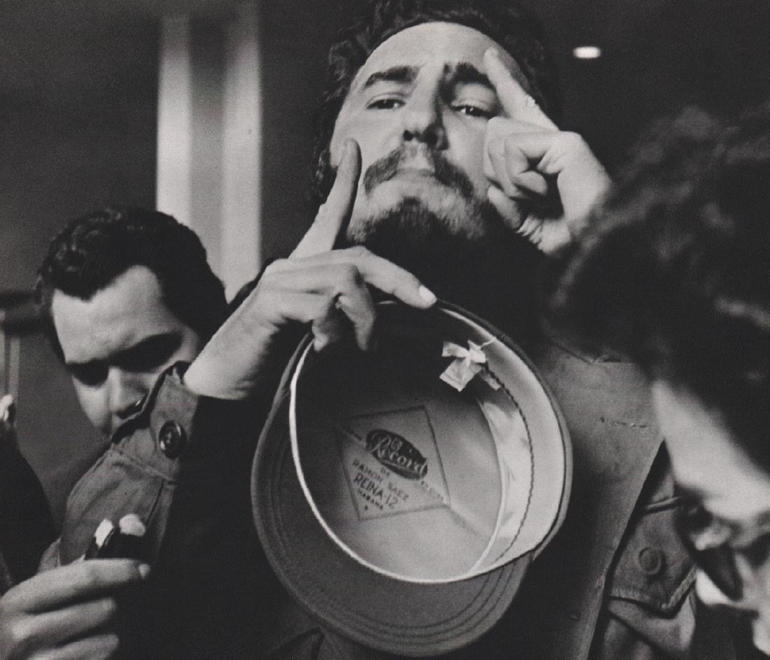 ALFRED EISENSTAEDT - Fidel Castro: Artist: ALFRED EISENSTAEDT Print Title: Fidel Castro at the Hotel Theresa in Harlem Medium: Sheet-fed Gravure Printing Date: 1966 Printed in Switzerland Image Size: 9 x 8 inches Alfred Eisenstaedt (18