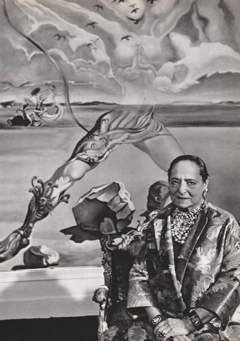 ALFRED EISENSTAEDT - Helena Rubinstein: Artist: ALFRED EISENSTAEDT Print Title: Helena Rubinstein and a Mural by Dali Medium: Sheet-fed Gravure Printing Date: 1966 Printed in Switzerland Image Size: 8.5 x 12.5 inches Alfred Eisenstaedt (189