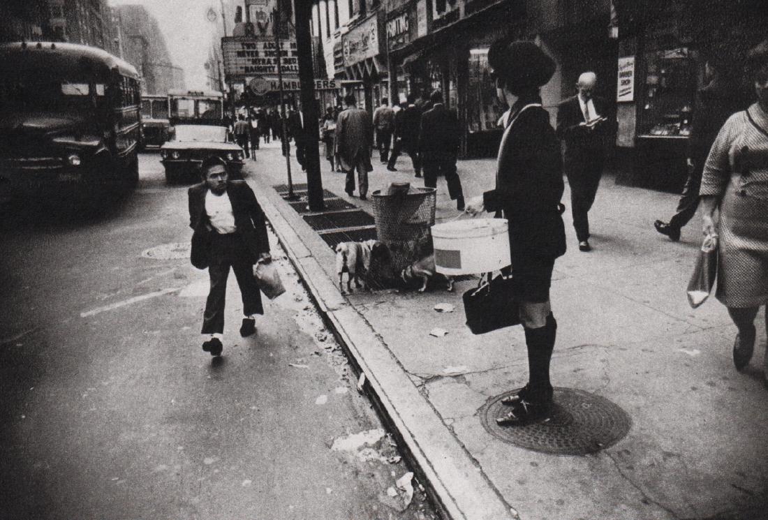 GARRY WINOGRAND - New York City, 1968: Artist: GARRY WINOGRAND Print Title: New York City, 1968 Medium: Sheet-fed Gravure Printing Date: 1972 Printed in England Image Size: 7.25 x 5 inches Garry Winogrand (1928-1984) was a street photograp