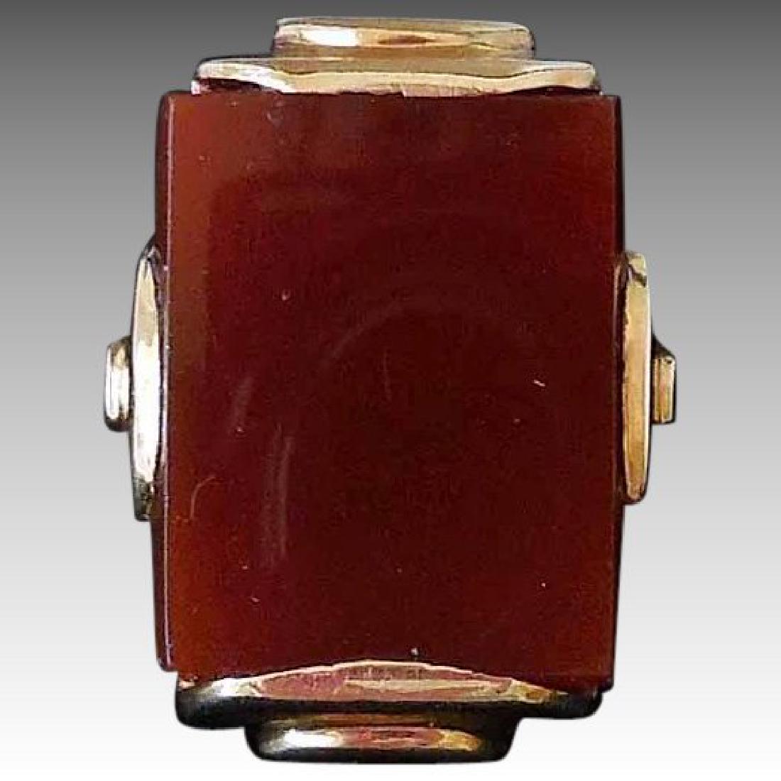 14K Gold & Carnelian Art Deco Ring: Title: 14K Gold & Carnelian Art Deco Ring Maker: Unknown Origin: Unknown Date/Period: Ca 1920s-1950s Materials: 14K Yellow Gold, Natural Carnelian Size: 7.5 This distinctive ring is marked inside the 