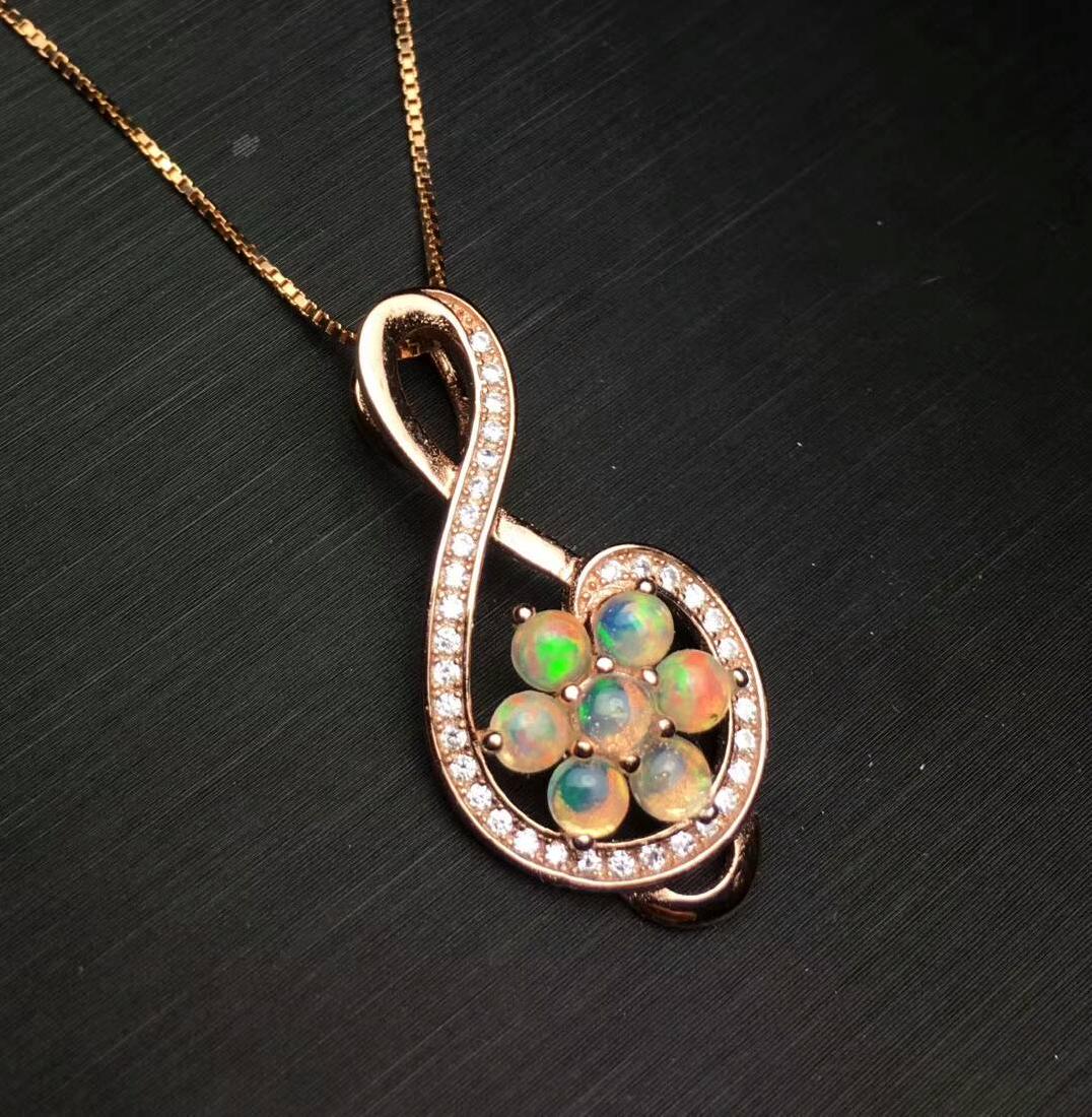 1.05ct Opal Pendant in 925 Silver: Stone: Opal Main Stone size:3*3mm Color:white Carat Total Weight:0.15ct Shape: Oval Clarity: Transparent Cut:Brilliant weight:5.0 gr Stone: Zircon Accept Buyer s Re-identification Authe