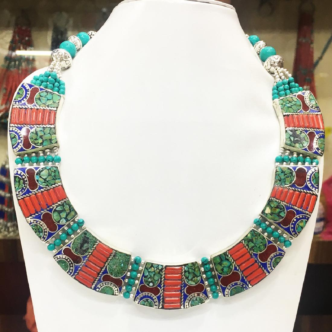 Turquoise Coral Mexican Choker Necklace: Item: Turquoise Coral Mexican Choker Necklace Origin: Tibetan Metal: Tibetan silver Handmade Gemstones: Turquoise & Coral Size (in): 20 Please note that this lot has a confidential reserve. When you l