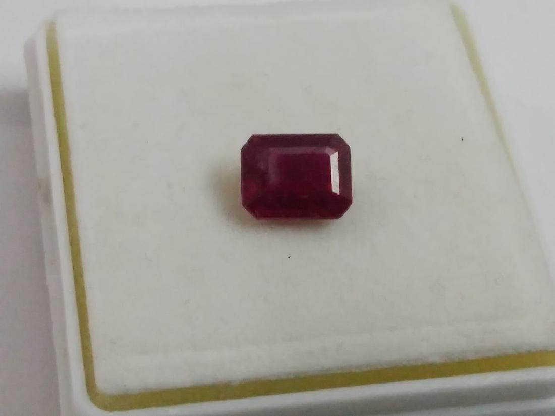 Emerald Cut Ruby: Title: Emerald Cut Ruby Metal Purity (If Applicable): Gemstones: Ruby Carat Weights: 2.46 Size/Dimensions: 9 x 7 x 3 No of Pcs.: 1 Additional Info: Please note that this lot has a confidential reserve