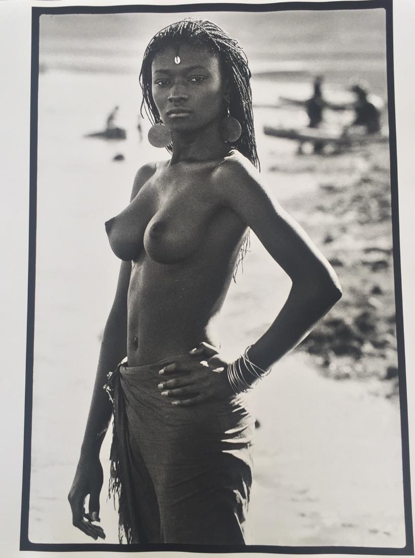 After Peter Beard Photo Untitled (Fayel Tall): Artist: After Peter Beard - American, b. 1938 Title, Year: Untitled (Fayel Tall) Medium: Black and white photographic print Dimensions: Image size: 19.25" H x 13.25" W Sheet size: 19.5" H x 15.5" W Si