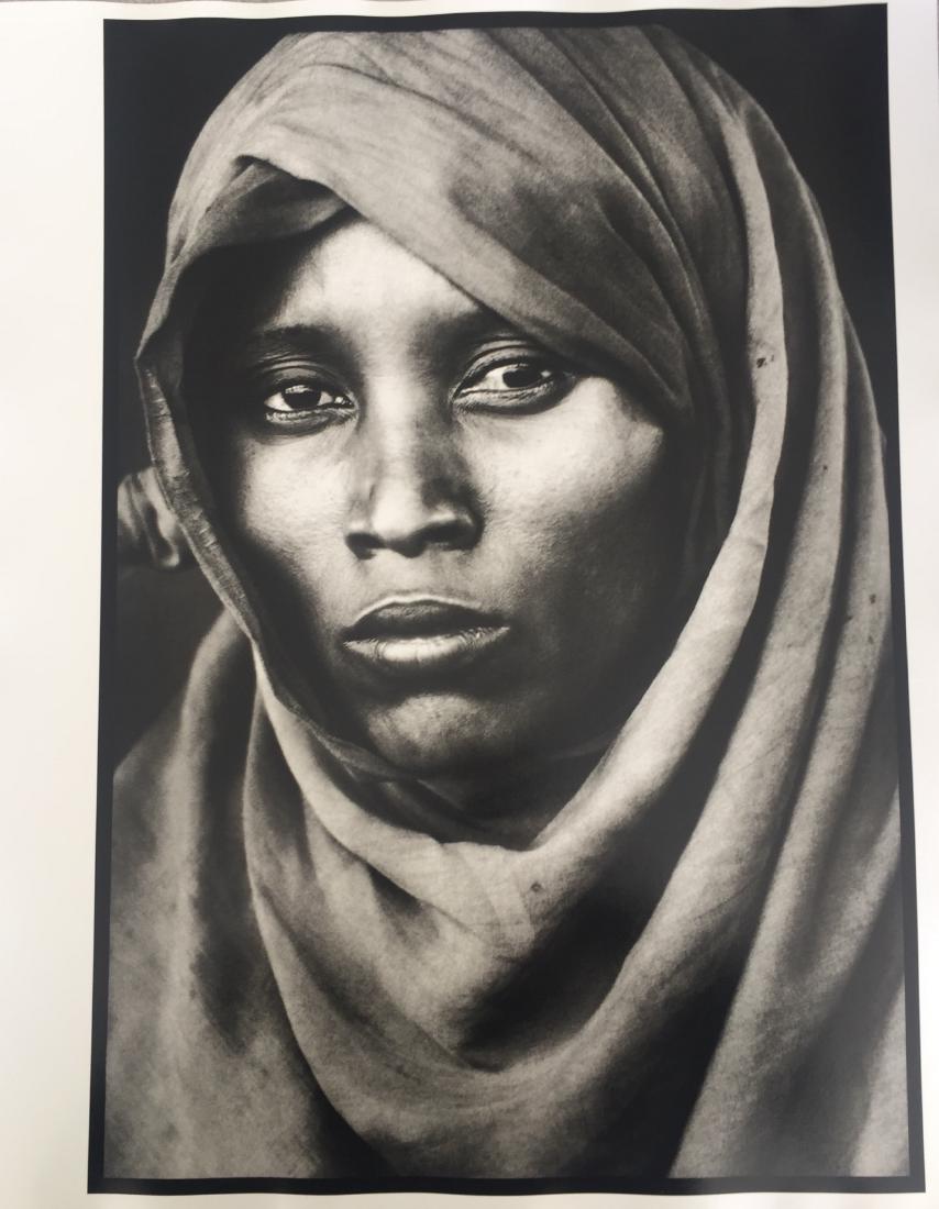 After Peter Beard Photo Untitled (Boran Woman): Artist: After Peter Beard - American, b. 1938 Title, Year: Untitled (Boran Woman) Medium: Black and white photographic print Dimensions: Image size: 19.25" H x 13.25" W Sheet size: 19.5" H x 15.5" W S