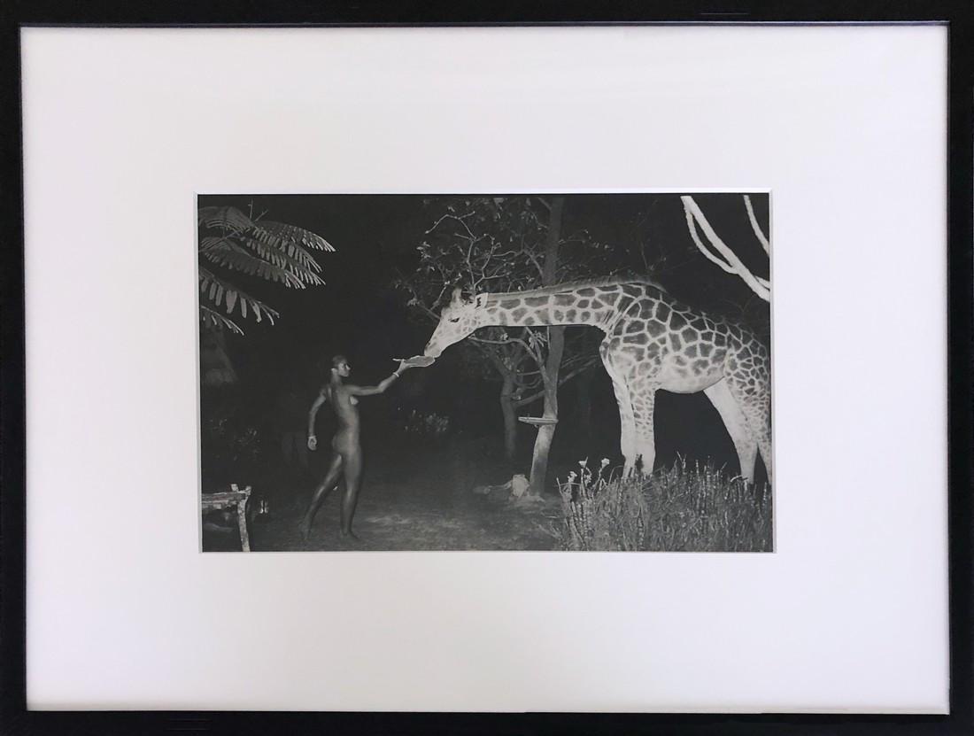 After Peter Beard Photo Untitled (Maureen Gallagher and: Artist: After Peter Beard - American, b. 1938 Title, Year: Untitled (Maureen Gallagher and a night feeder at Hog Ranch, 2:00 am, February 1987) Medium: Black and white photographic print Dimensions: I