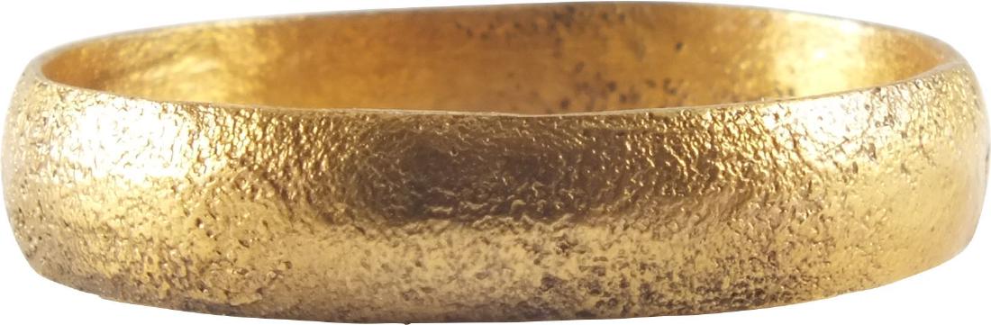 VIKING MAN'S WEDDING RING 10th-11th CENTURY: Gilt bronze. Size 11 1/2. Broad rounded band. Professionally refurbished with the gold overlay restored. Vikings exchanged wedding rings on the pommel of the groom’s sword. Comes gift boxed with a c