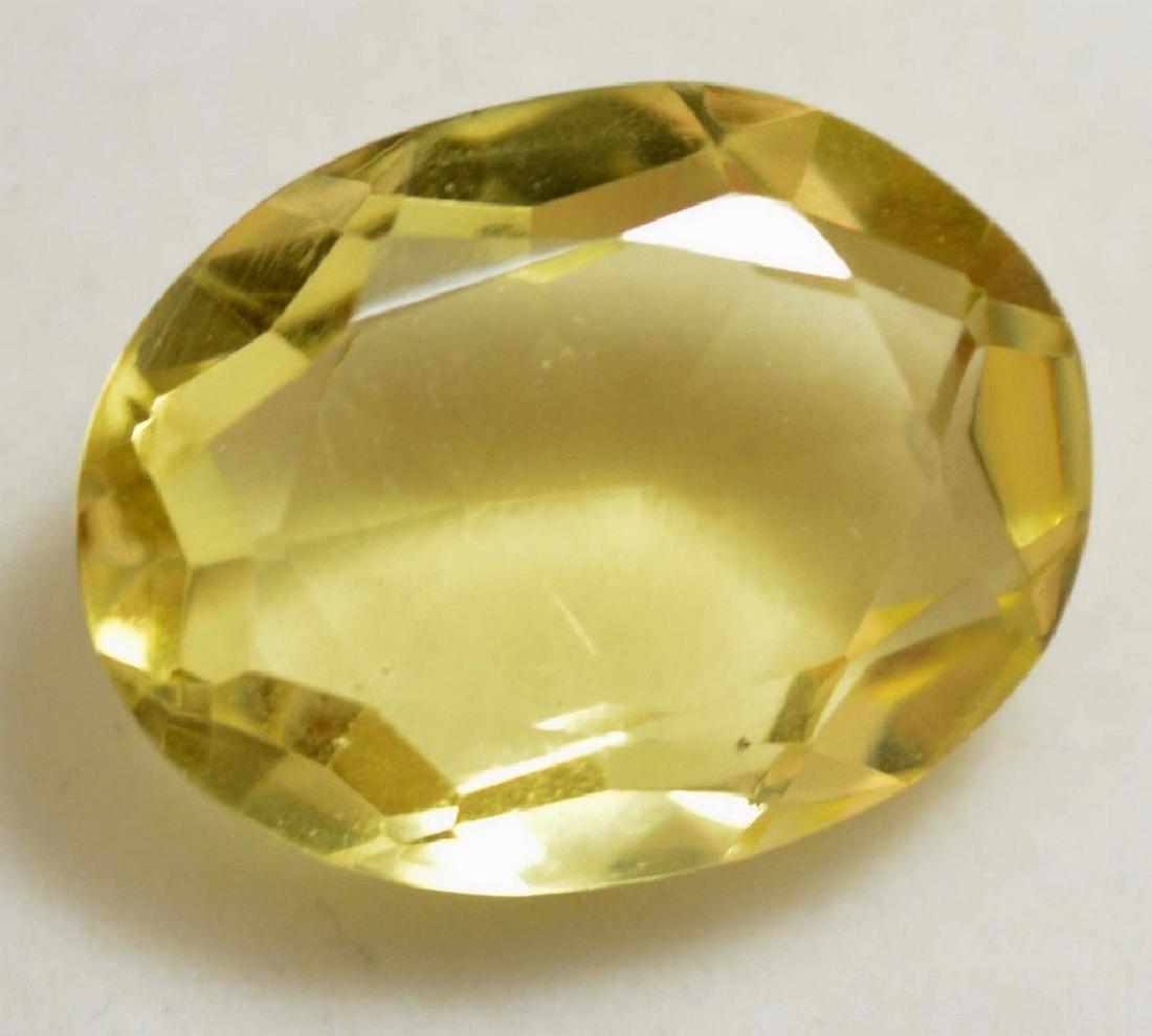 15.80 Ct Natural Huge Lemon Citrine GGL Certified: Size: 19.92x15.09x8.21 mm Shape: Oval Colour: Bright Golden/Yellow Clarity: vvs Lustre: Excellent Hardness: 7 certificat : GGL No Reserve: This lot starts at $1 and has no reserve as a courtesy so tha
