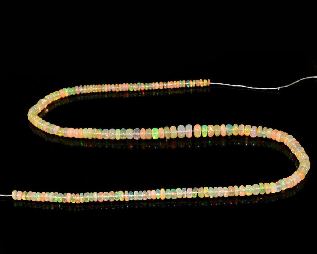 Amazing Flash Fire Opal Beads Strand (1 of 2)
