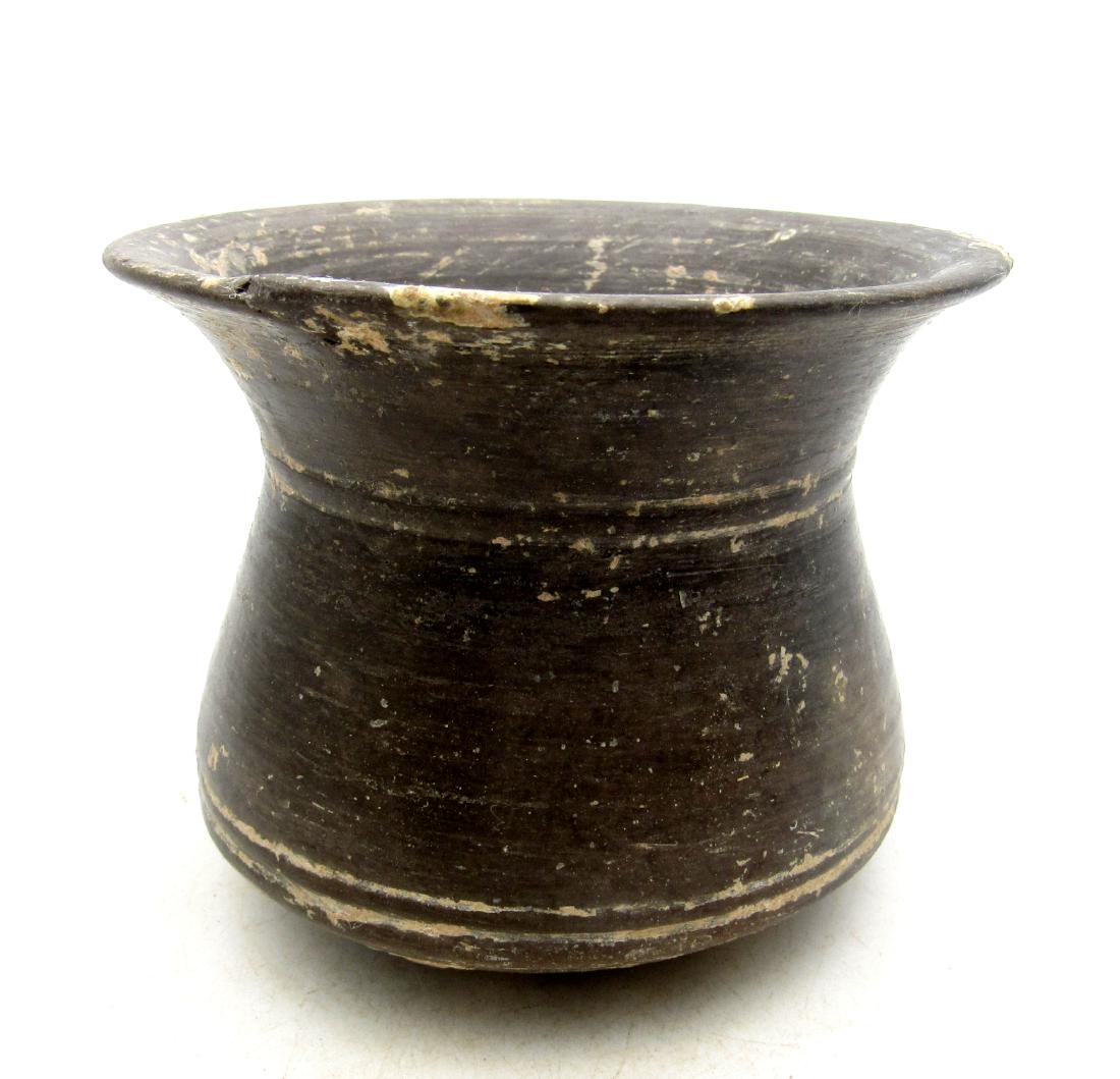 Ancient Blackware Greek Cup: Title: Ancient Blackware Greek Cup Date: C. 200 BC Interesting Ancient Blackware Greek Cup, Complete, original, unrestored condition with fine ancient glaze. Excellent display piece. Material: terraco