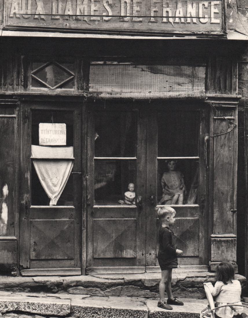 PAUL STRAND - Aux Dames de France: Artist: PAUL STRAND Print Title: Aux Dames de France Medium: Sheet-Fed Gravure Printing Date: 1952 Printed in Switzerland Image Size: 7.25 X 9.25 inches Paul Strand (1890–1976) was an American photo