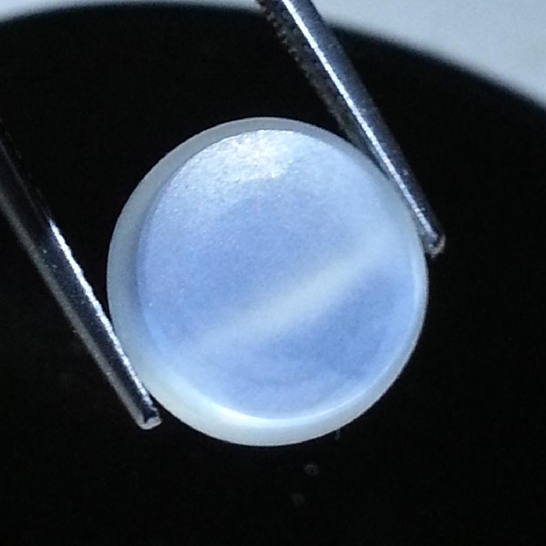 Moonstone Cat's Eye - 7.02 ct: Item: Moonstone Cat's Eye - 7.02 ct Loose gemstone Color/Clarity: IF - VVS Carat Weight: 7.02 Size (mm): 13.10 x 13.20 x 5.10 Round - Srilanka No Reserve: This lot starts at $1 and has no reserve as a