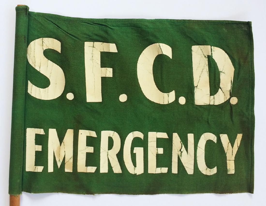 Circa 1940s San Francisco Civil Defense Flag: Title: Circa 1940s San Francisco Civil Defense Flag Dimensions: Size: Actual Flag is about 12" x 16". Sticks is about 30". Condition: Soiling and cracks on lettering. Some of the cracks have created s