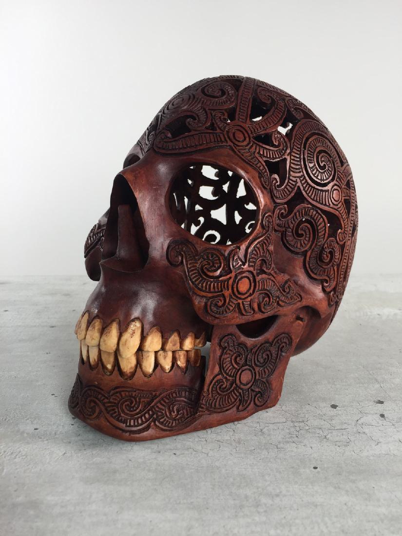 Hand carved Human skull -Traditional Dayak carving,: Title: Hand carved Human skull -Traditional Dayak carving, Indonesia - 21st century Maker: Kadek - Dayak Tribe Origin: Indonesia Date/Period: 2017 Materials: Wood Length 19.5cm / 7.7 inches, width 13c