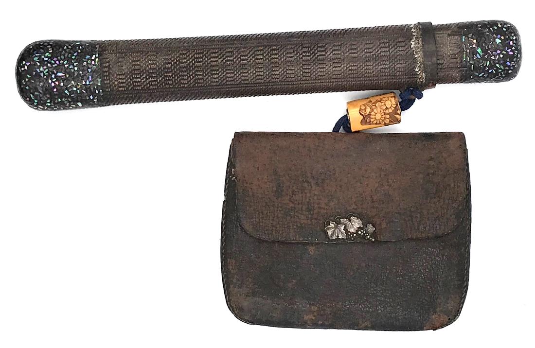 Tobacco-pouch (doran), pipecase (kiseru-zutsu), and: Item: Tobacco-pouch (doran), pipecase (kiseru-zutsu), and ojime; kanamono with grapes motif Origin: Japan Date: Edo/Meiji Materials: Wood, bone, leather, mother-of-pearl, silver Dimensions: pipecase: 