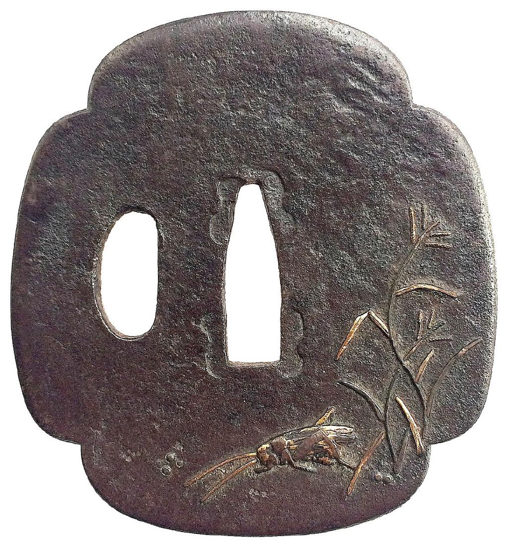 Iron tsuba with shakudo and gold inlay; with: Item: Iron tsuba with shakudo and gold inlay; with provenance Origin: Japan Date: Edo period Materials: Iron, shakudo, gold Dimensions: Height: 73.1 mm; Width: 67.3 mm; Thickness: 2.5 mm at seppa-dai,