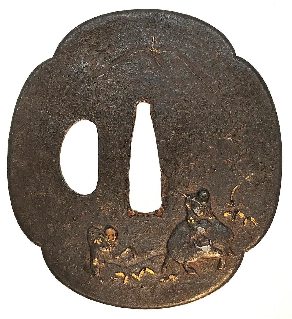 Iron tsuba carved and inlaid with copper, shakudo,: Item: Iron tsuba carved and inlaid with copper, shakudo, silver, and gold. Minamoto no Yoshitsune motif. Origin: Japan Date: Edo period Materials: Iron, copper, shakudo, silver, gold Dimensions: Heigh