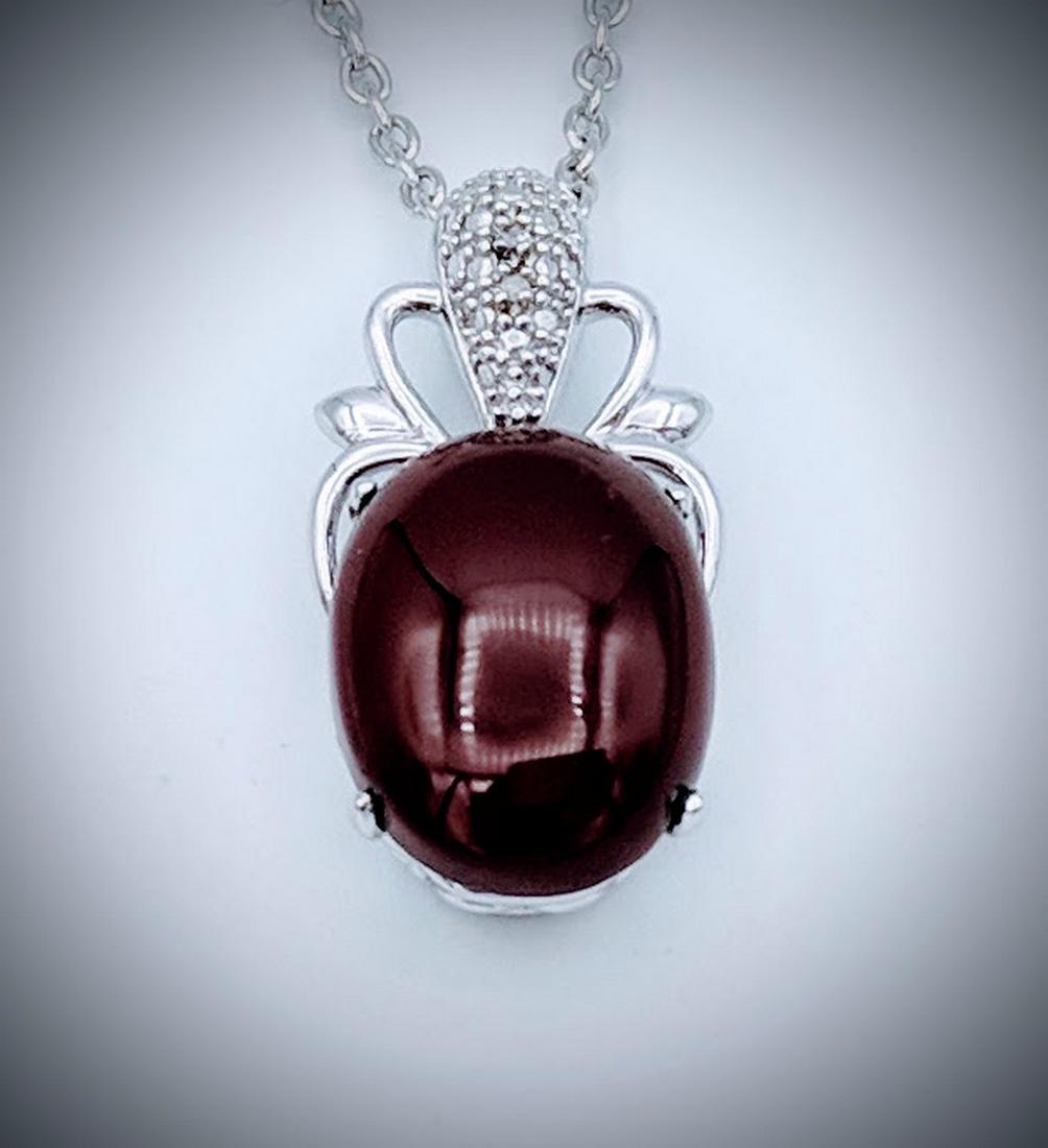 Sterling Silver Carnelian Diamond Necklace: Item: Sterling Silver Necklace and Pendant with Carnelian and Diamonds Brand: Jean Lin Collection Metal Purity: 925 Sterling Silver Gemstones: Carnelian and Diamonds Size: Pendant measures at 25.8mm 1
