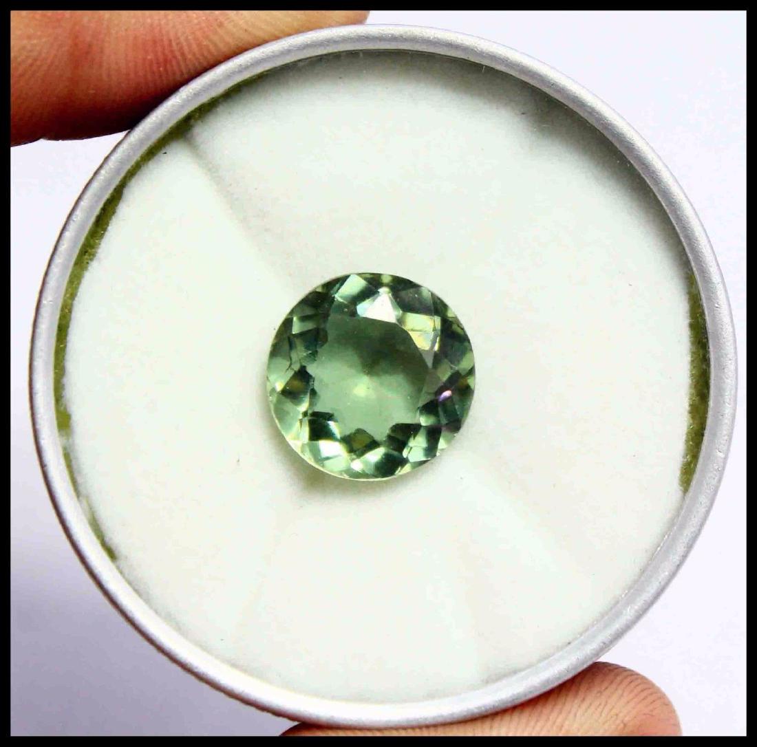 11.35Ct Alexandrite Color Changing EGL Certified: Shape: round Transparency: Transparent Cut Grade: Very Good Color: As in pic Treatment: Hue-Enhanced Natural/Lab-Created: Lab-Created Country of Origin: Russian Federation Certificate: EGL No Reserve: